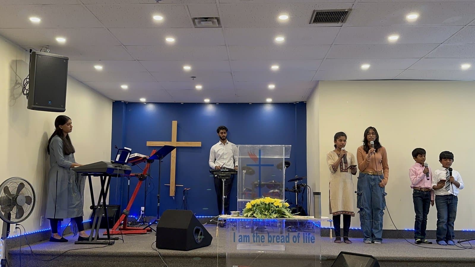 Children and youth leading worship on stage