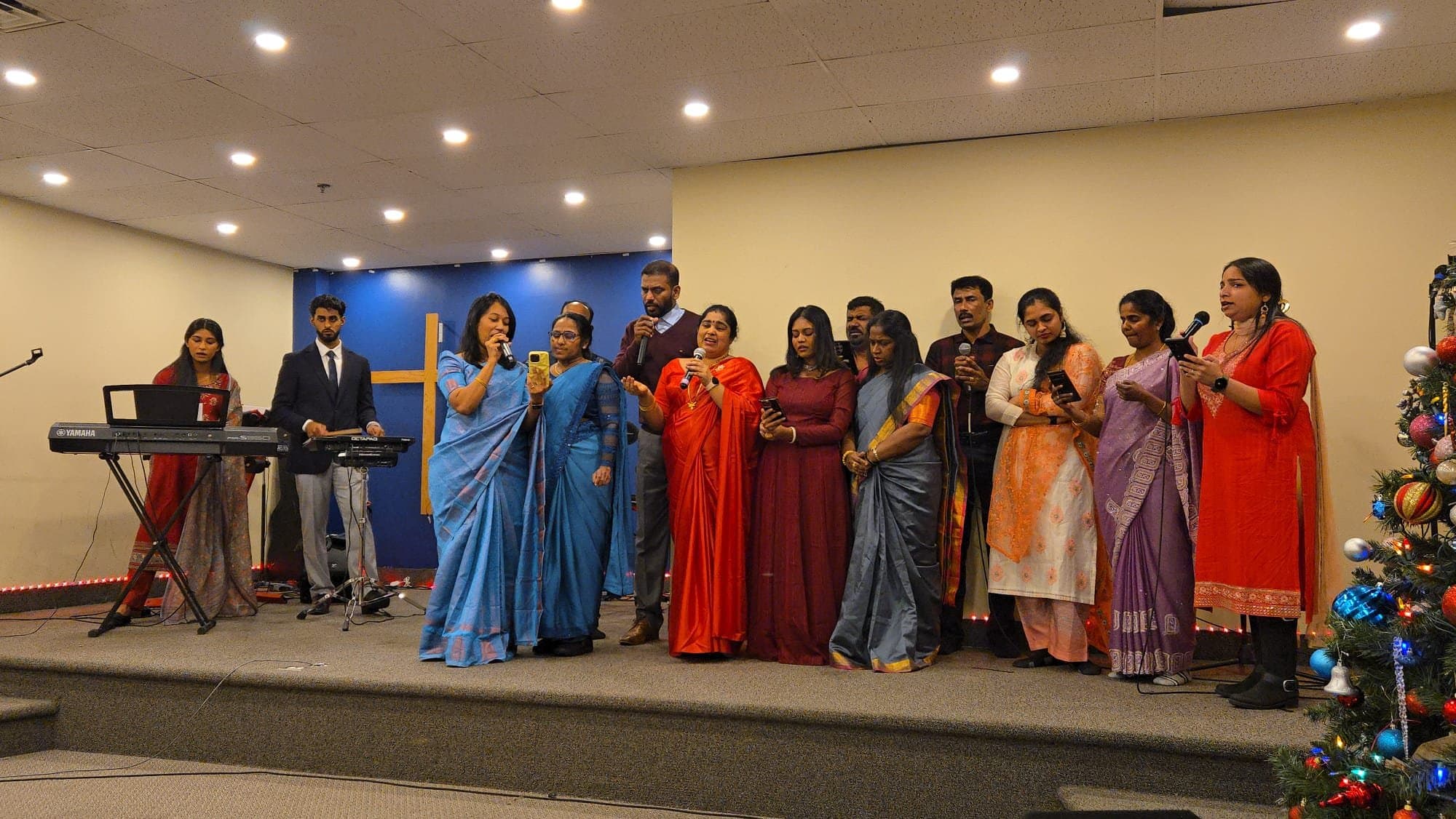 The worship team leading singing at Gateway Gospel Church